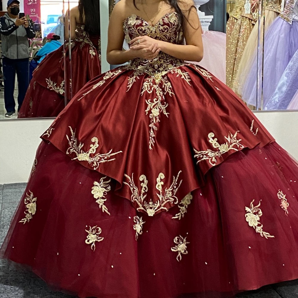 Red/Burgendy Quinceañera dress from Moda 2000. Used once. Needs dry cleaning.